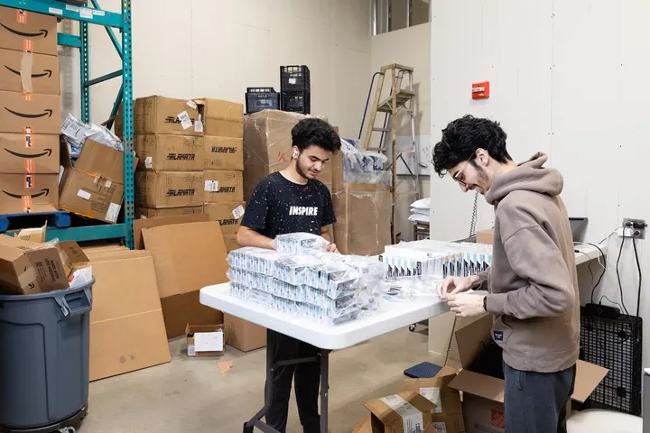 A WareSpace tenant working among inventory and packing supplies