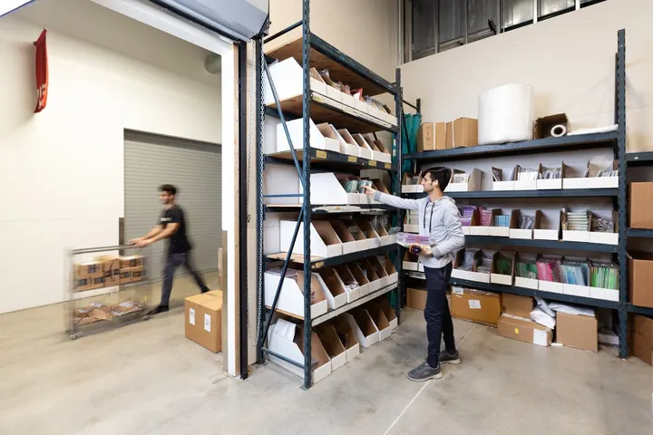 WareSpace tenant team members picking inventory inside their unit