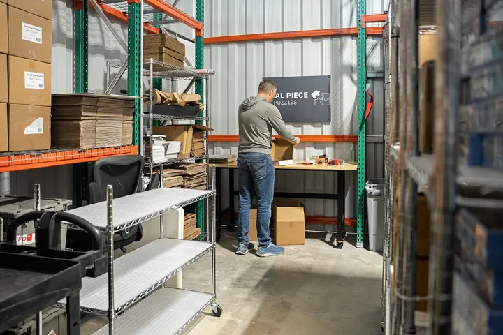 A small business owner packing products inside a WareSpace unit